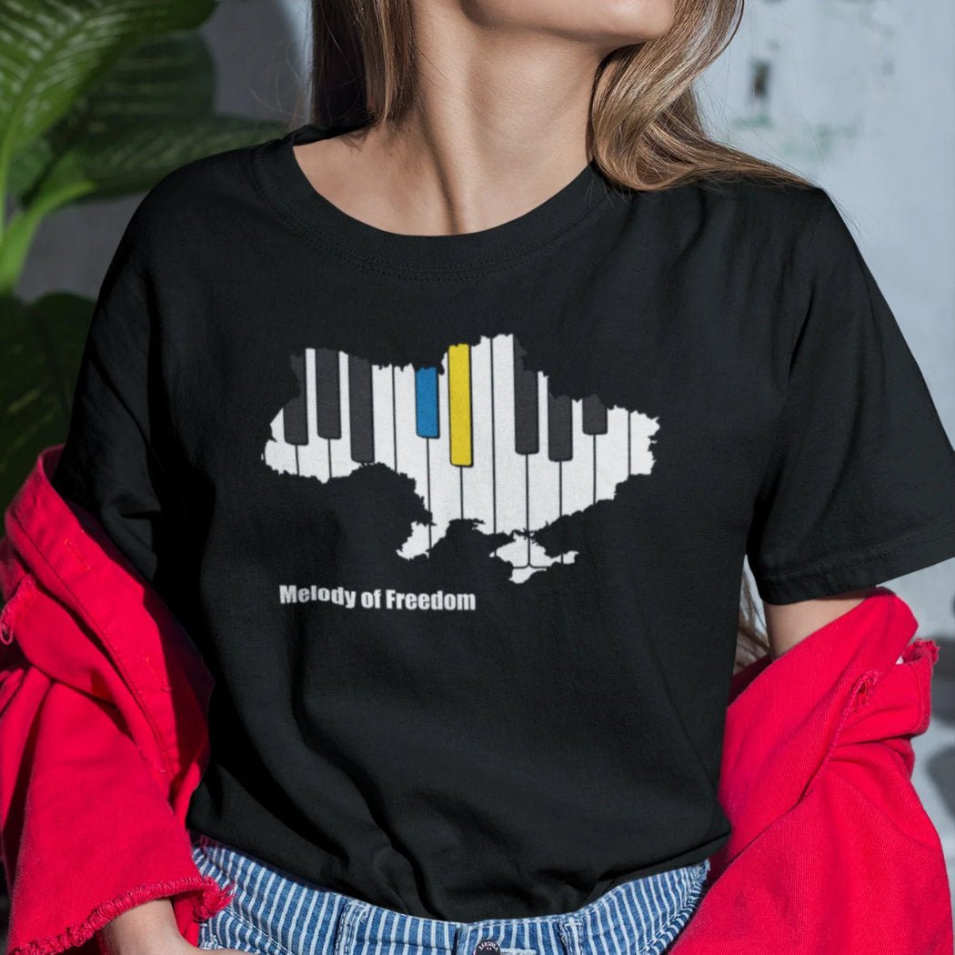 Trička s motivem Melody of Freedom pomáhají - TEE Design CZ
