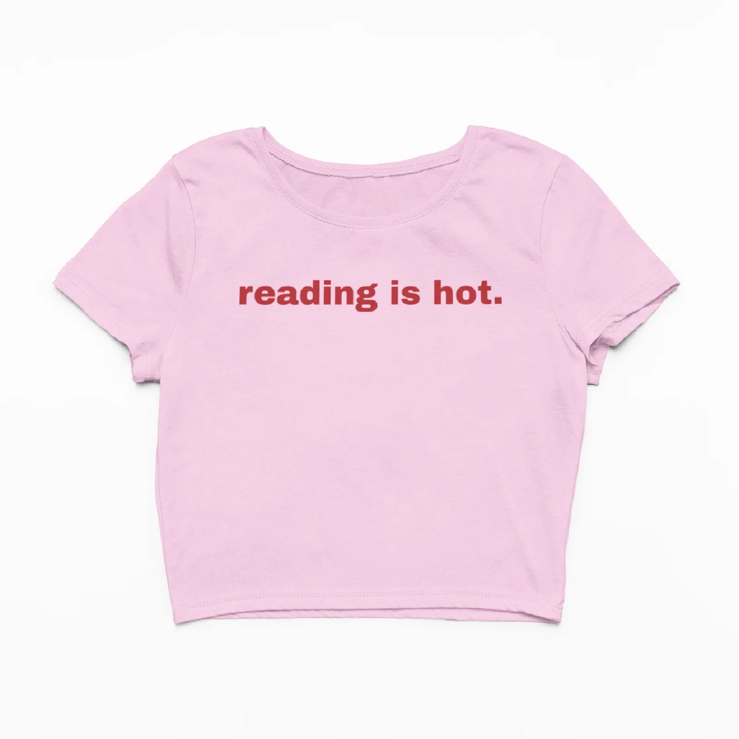 Růžový crop top s nápisem Reading is hot