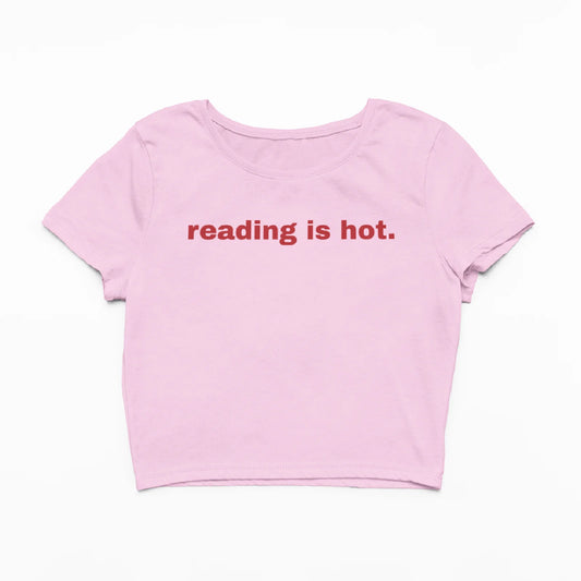 Růžový crop top s nápisem Reading is hot